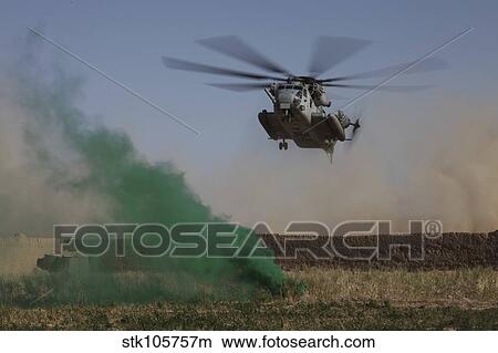 Picture - A CH-53 Super Stallion helicopter prepares to land in Afghanistan.. Fotosearch