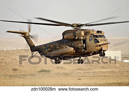 A CH-53 Yasur 2000 of the Israeli Air Force in a rescue demonstration. View Large Photo Image Picture - A CH-53 Yasur 2000 of the Israeli Air Force in a rescue demonstration.. Fotosearch