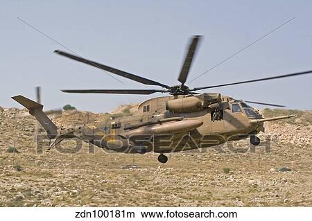 A CH-53 Yasur 2000 of the Israeli Air Force landing in the field. View Large Photo Image Picture - A CH-53 Yasur 2000 of the Israeli Air Force landing in the field.. Fotosearch
