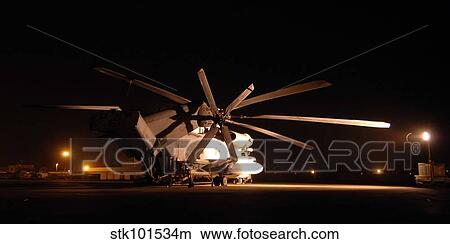 A CH-53E Sea Stallion sits parked on the flight line. View Large Photo Image Picture - A CH-53E Sea Stallion sits parked on the flight line.. Fotosearch