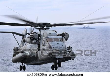A CH-53E Super Stallion conducts flight operations. View Large Photo Image Picture - A CH-53E Super Stallion conducts flight operations.. Fotosearch