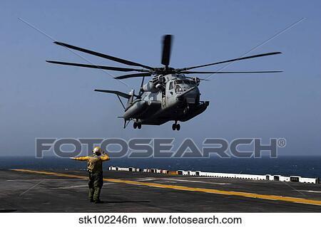 A CH-53E Super Stallion helicopter aboard the amphibious assault ship USS Bataan. View Large Photo Image Picture - A CH-53E Super Stallion helicopter aboard the amphibious assault ship USS Bataan.. Fotosearch