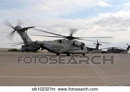 A CH-53E Super Stallion helicopter taxies down the flight line. View Large Photo Image Picture - A CH-53E Super Stallion helicopter taxies down the flight line.. Fotosearch