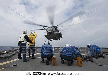 A CH-53E Super Stallion takes off from USS Ashland. View Large Photo Image Picture - A CH-53E Super Stallion takes off from USS Ashland.. Fotosearch