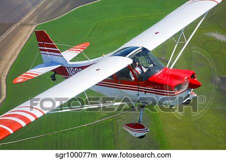 A Champion Aircraft Citabria in flight. View Large Photo Image Picture - A Champion Aircraft Citabria in flight.. Fotosearch