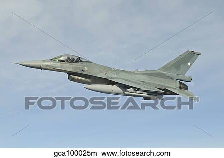 A Chilean Air Force F-16 soars through the sky over Brazil. View Large Photo Image Picture - A Chilean Air Force F-16 soars through the sky over Brazil.. Fotosearch