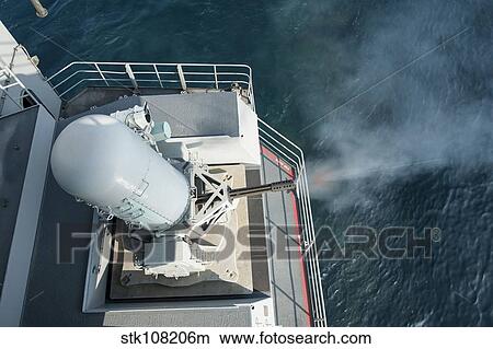 A close-in weapons system fires aboard USS Harry S. Truman. View Large Photo Image Picture - A close-in weapons system fires aboard USS Harry S. Truman.. Fotosearch