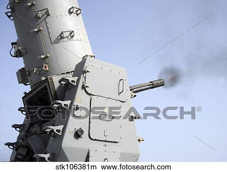 A close-in weapons system fires during an operational test aboard USS Vicksburg. View Large Photo Image Picture - A close-in weapons system fires during an operational test aboard USS Vicksburg.. Fotosearch