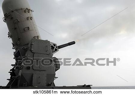 A close-in weapons system is fired aboard USS Makin Island. View Large Photo Image Picture - A close-in weapons system is fired aboard USS Makin Island.. Fotosearch
