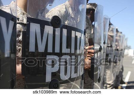 A close-up view of Marines holding riot control shields. View Large Photo Image Picture - A close-up view of Marines holding riot control shields.. Fotosearch