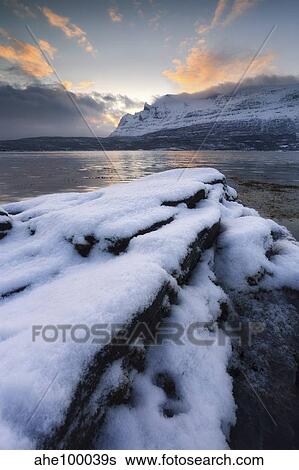 A cold morning in Grovfjorden, Troms County, Norway. View Large Photo Image Stock Photograph - A cold morning in Grovfjorden, Troms County, Norway.. Fotosearch