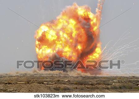 A controlled detonation is set off to destroy unexploded ordnance outside Bassami, Iraq. View Large Photo Image Picture - A controlled detonation is set off to destroy unexploded ordnance outside Bassami, Iraq.. Fotosearch
