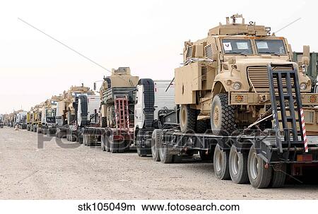 A convoy of Mine-Resistant Ambush Protected vehicles ready for departure. View Large Photo Image Picture - A convoy of Mine-Resistant Ambush Protected vehicles ready for departure.. Fotosearch