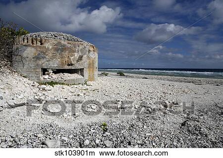 Picture - A crumbling bunker serves as a testament to the Japanese's hold on Wake Island.. Fotosearch