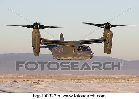 Picture - A CV-22 Osprey flies in helicopter mode.. Fotosearch