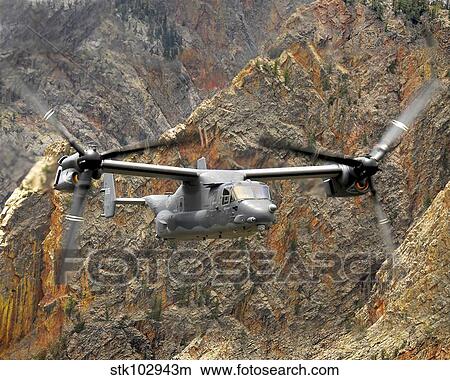 A CV-22 Osprey flies over the canyons in northern New Mexico. View Large Photo Image Picture - A CV-22 Osprey flies over the canyons in northern New Mexico.. Fotosearch
