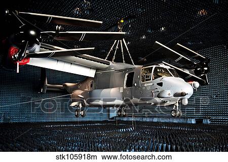 A CV-22 Osprey hangs in a anechoic chamber. View Large Photo Image Picture - A CV-22 Osprey hangs in a anechoic chamber.. Fotosearch