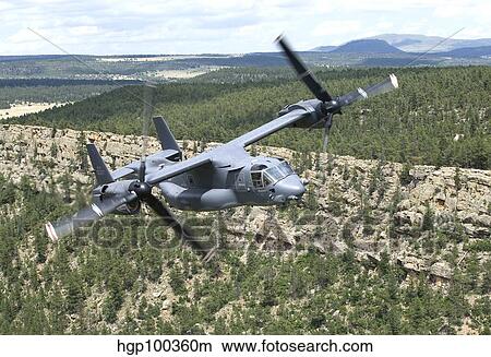 A CV-22 Osprey on a training mission over New Mexico. View Large Photo Image Picture - A CV-22 Osprey on a training mission over New Mexico.. Fotosearch