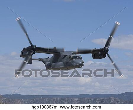 A CV-22 Osprey on a training mission over New Mexico. View Large Photo Image Picture - A CV-22 Osprey on a training mission over New Mexico.. Fotosearch
