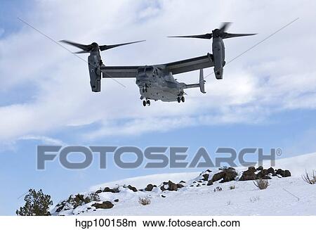 A CV-22 Osprey prepares to land during a training mission. View Large Photo Image Picture - A CV-22 Osprey prepares to land during a training mission.. Fotosearch