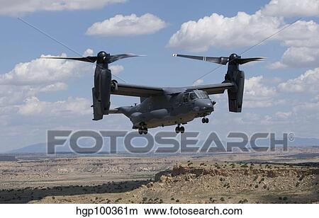 A CV-22 Osprey prepares to land during a training mission. View Large Photo Image Picture - A CV-22 Osprey prepares to land during a training mission.. Fotosearch