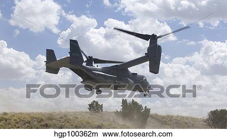 A CV-22 Osprey prepares to land during a training mission. View Large Photo Image Picture - A CV-22 Osprey prepares to land during a training mission.. Fotosearch