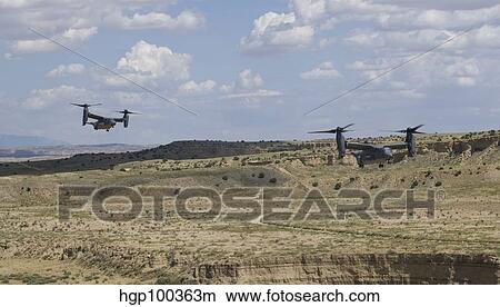 Picture - A CV-22 Osprey prepares to land during a training mission.. Fotosearch