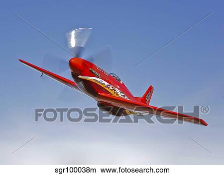 A Dago Red P-51G Mustang in flight. View Large Photo Image Picture - A Dago Red P-51G Mustang in flight.. Fotosearch