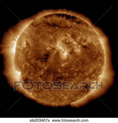 A dark rift in the sun's atmosphere known as a coronal hole. View Large Photo Image Stock Photograph - A dark rift in the sun's atmosphere known as a coronal hole.. Fotosearch