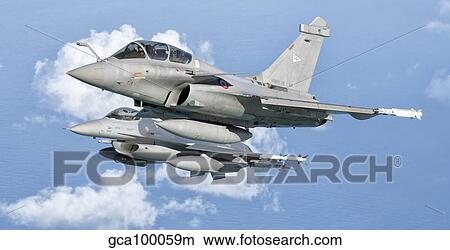 A Dassault Rafale of the French Air Force flys alongside a U. S. Air Force F-16C Fighting Falcon. View Large Photo Image Picture - A Dassault Rafale of the French Air Force flys alongside a U. S. Air Force F-16C Fighting Falcon.. Fotosearch