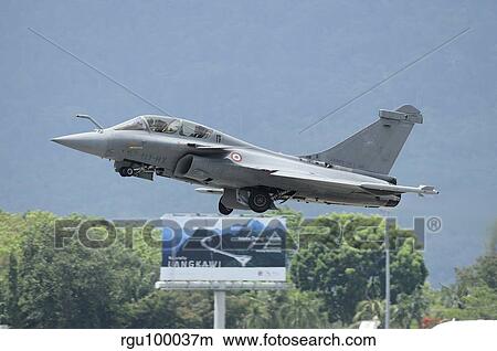 A Dassault Rafale of the French Air Force taking off. View Large Photo Image Picture - A Dassault Rafale of the French Air Force taking off.. Fotosearch