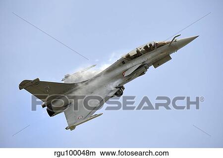 Picture - A Dassault Rafale of the French Air Force in flight over Malaysia.. Fotosearch