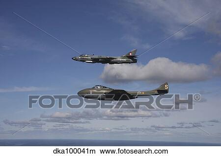 A de Havilland DH 115 Vampire and Hawker Hunter vintage jet fighters. View Large Photo Image Picture - A de Havilland DH 115 Vampire and Hawker Hunter vintage jet fighters.. Fotosearch
