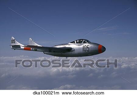 A de Havilland DH 115 Vampire trainer in the air over Sweden. View Large Photo Image Picture - A de Havilland DH 115 Vampire trainer in the air over Sweden.. Fotosearch