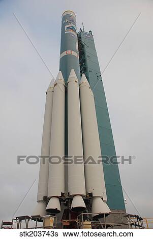 Stock Photograph - A Delta II rocket with several solid rocket motors attached.. Fotosearch
