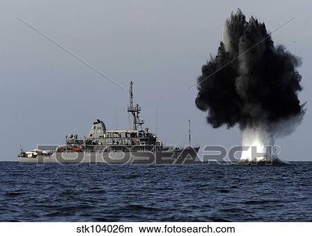 A demolition charge detonates 1, 500 meters in front of USS Scout. View Large Photo Image Picture - A demolition charge detonates 1, 500 meters in front of USS Scout.. Fotosearch