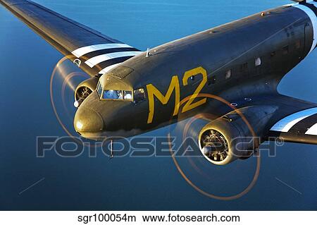 A Douglas C-53 Skytrooper in flight near Chino, California. View Large Photo Image Picture - A Douglas C-53 Skytrooper in flight near Chino, California.. Fotosearch