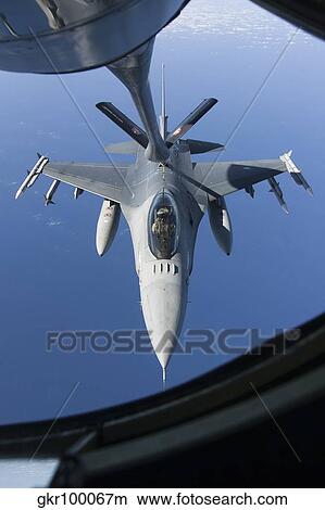 A Dutch F-16AM conducts in-flight refueling. View Large Photo Image Picture - A Dutch F-16AM conducts in-flight refueling.. Fotosearch