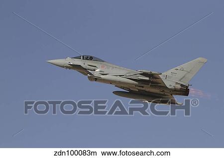 A Eurofighter Typhoon of the Italian Air Force taking off. View Large Photo Image Picture - A Eurofighter Typhoon of the Italian Air Force taking off.. Fotosearch