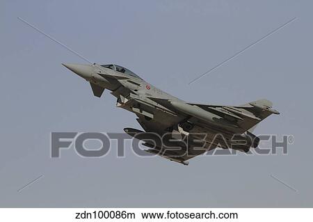 A Eurofighter Typhoon of the Italian Air Force taking off. View Large Photo Image Picture - A Eurofighter Typhoon of the Italian Air Force taking off.. Fotosearch