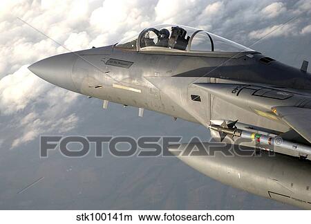A F-15 Eagle patrols the sky during a combat air patrol mission. View Large Photo Image Picture - A F-15 Eagle patrols the sky during a combat air patrol mission.. Fotosearch