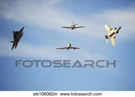 A F-22 Raptor, F-86 Sabre, P-51 Mustang and F-4 Phantom in a heritage flight. View Large Photo Image Picture - A F-22 Raptor, F-86 Sabre, P-51 Mustang and F-4 Phantom in a heritage flight.. Fotosearch