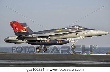 Picture - A F/A-18C Hornet takes off from the flight deck of USS George H. W. Bush.. Fotosearch