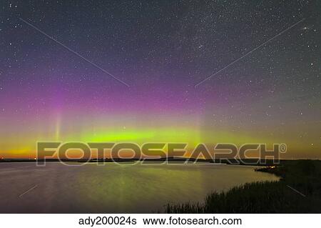 A faint aurora over Crawling Lake reservoir, Bassano, Alberta, Canada. View Large Photo Image Stock Photograph - A faint aurora over Crawling Lake reservoir, Bassano, Alberta, Canada.. Fotosearch