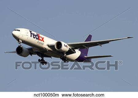 A Federal Express Boeing 777F cargo plane. View Large Photo Image Picture - A Federal Express Boeing 777F cargo plane.. Fotosearch