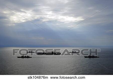 A fleet of multinational Navy ships transit the Korea Strait. View Large Photo Image Picture - A fleet of multinational Navy ships transit the Korea Strait.. Fotosearch
