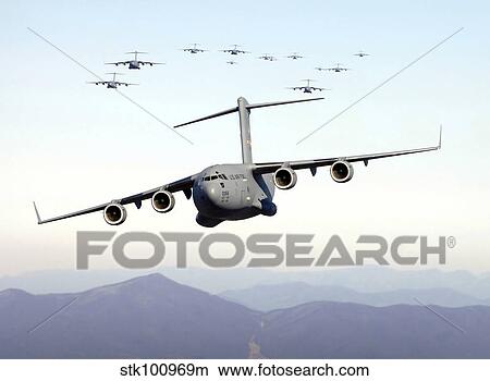 A formation of 17 C-17 Globemaster IIIs fly over the Blue Ridge Mountains. View Large Photo Image Picture - A formation of 17 C-17 Globemaster IIIs fly over the Blue Ridge Mountains.. Fotosearch