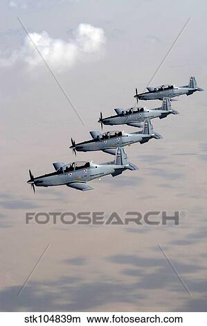 A formation of Iraqi Air Force T-6 Texan trainer aircraft over Tikrit, Iraq. View Large Photo Image Picture - A formation of Iraqi Air Force T-6 Texan trainer aircraft over Tikrit, Iraq.. Fotosearch