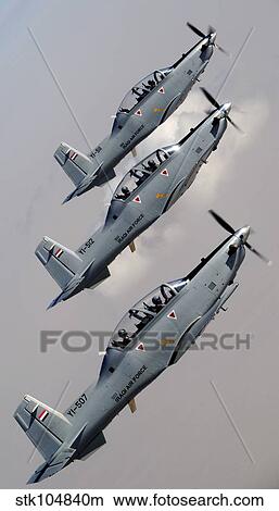 A formation of Iraqi Air Force T-6 Texan trainer aircraft over Tikrit, Iraq. View Large Photo Image Picture - A formation of Iraqi Air Force T-6 Texan trainer aircraft over Tikrit, Iraq.. Fotosearch