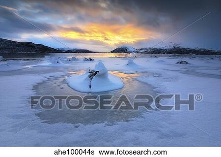 A frozen fjord that is part of Tjeldsundet in Troms County, Norway. View Large Photo Image Stock Photograph - A frozen fjord that is part of Tjeldsundet in Troms County, Norway.. Fotosearch